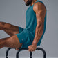 The Triumph Muscle Tank Top — Oceanic Teal