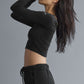 Asymmetric Sheer Glow Long‑Sleeve — Black