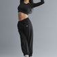 Asymmetric Sheer Glow Long‑Sleeve — Black