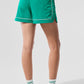 Motivate Track Shorts — Spruce Green/White